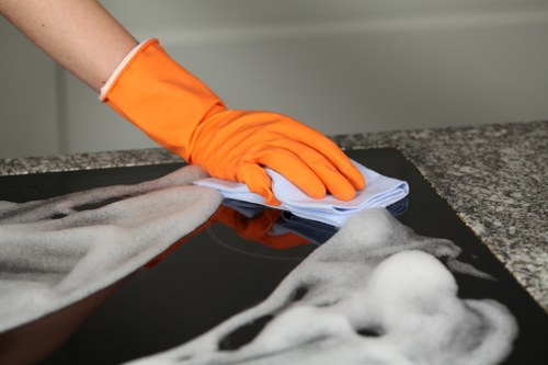 Local curtain cleaning team handling heavy fabric curtains