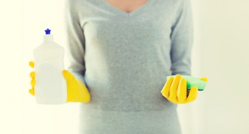 Local Maidavale cleaner working in a kitchen during a routine visit